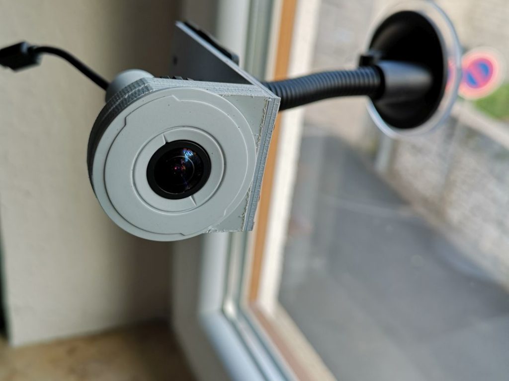 Flexible camera mounting with suction cup